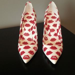 Aldo size 7, 4.5" white and red heels
